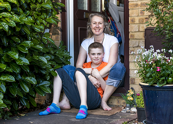 Mum and son happily chilling in on their doorstep during the Covid-19 Lockdown